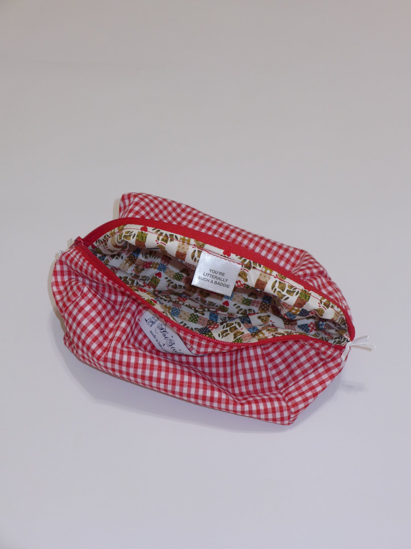 red gingham makeup bag